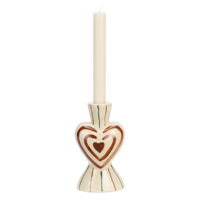 Madam Stoltz hand-painted candle holder with a prominent heart design, stripes, and a white candle.