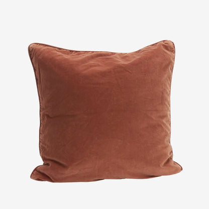 Madam Stoltz Velvet Cushion Cover in a rich reddish-brown or terracotta color, square shape, soft textured fabric.