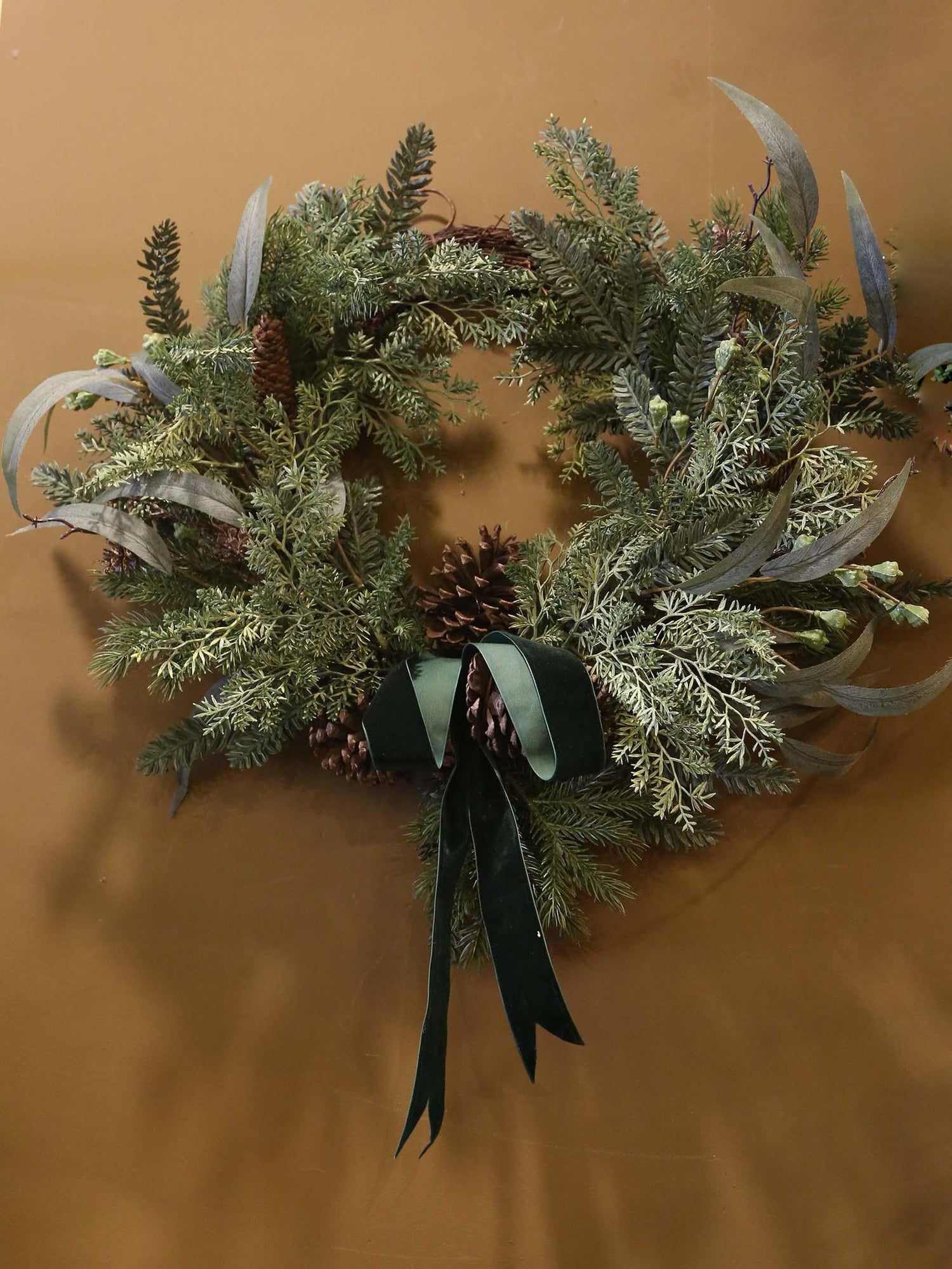Faux Pine Foliage Bow Wreath