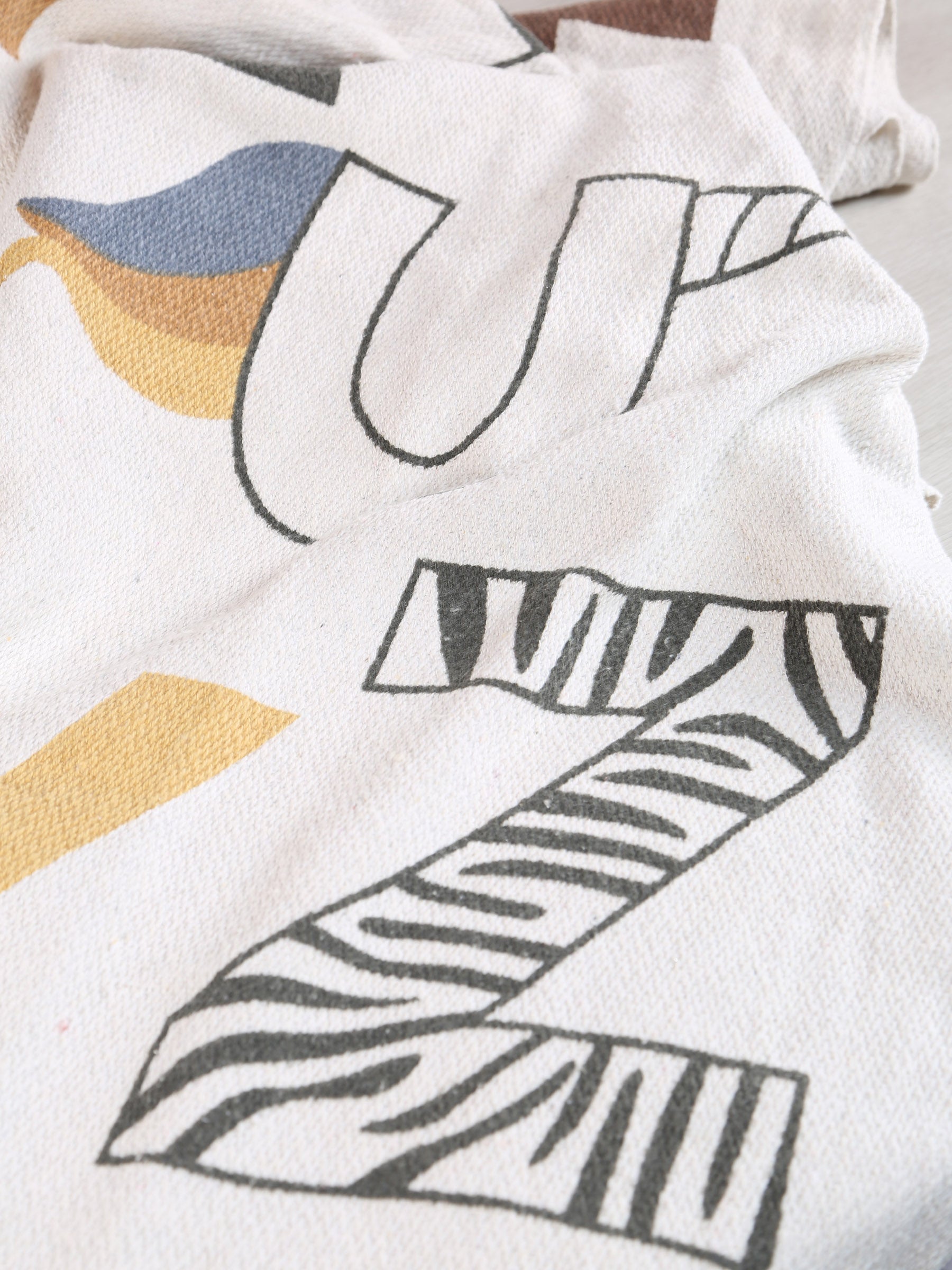 Memmo Geometric Lettering Recycled Cotton Throw - Multi