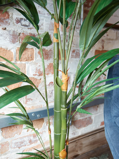 Green Faux Bamboo Palm Tree in Small Black Pot