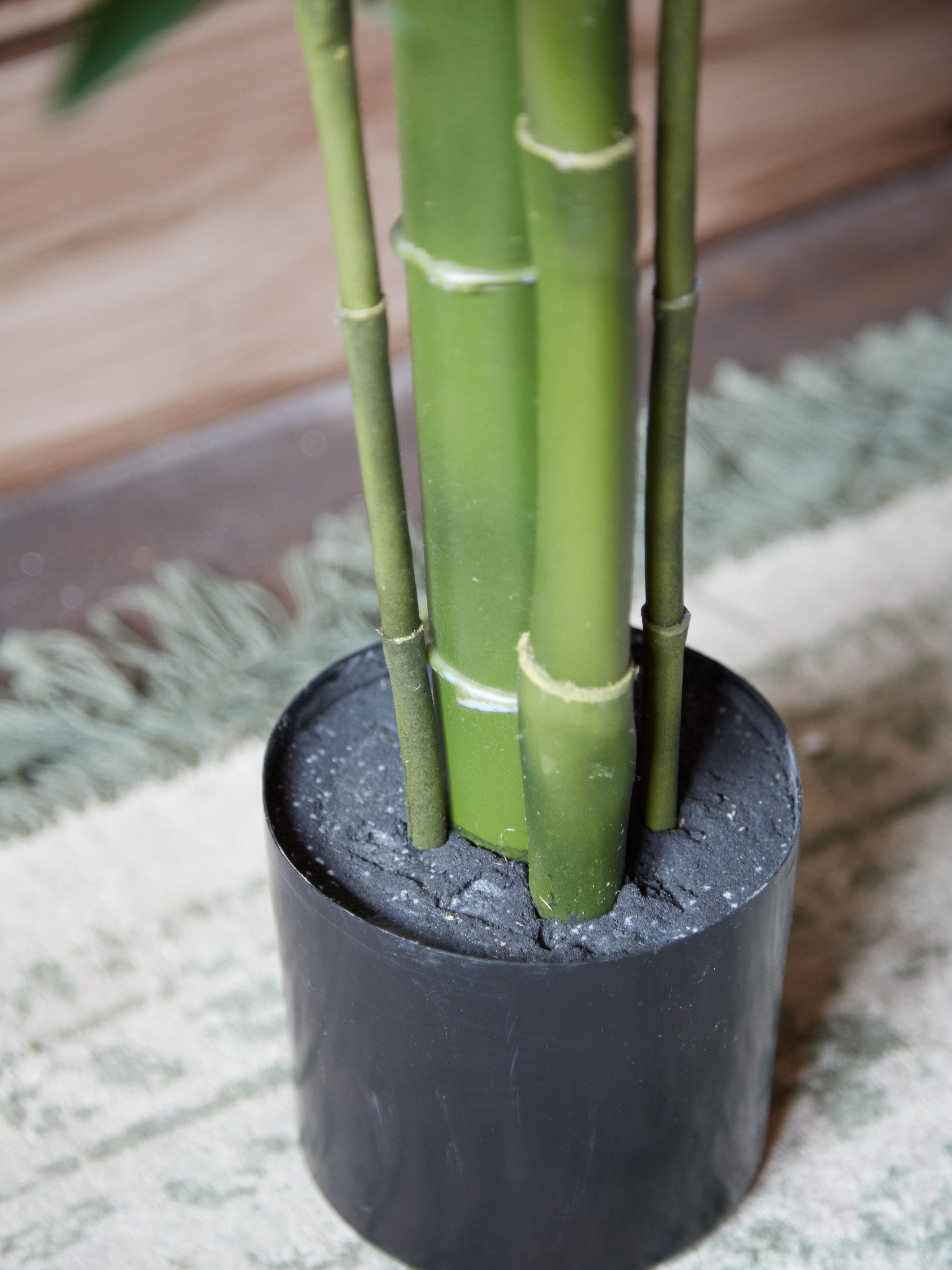 Green Faux Bamboo Palm Tree in Small Black Pot