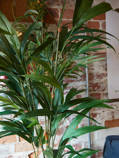 Green Faux Bamboo Palm Tree in Small Black Pot