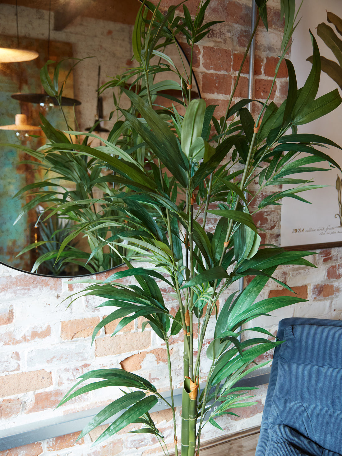 Green Faux Bamboo Palm Tree in Small Black Pot