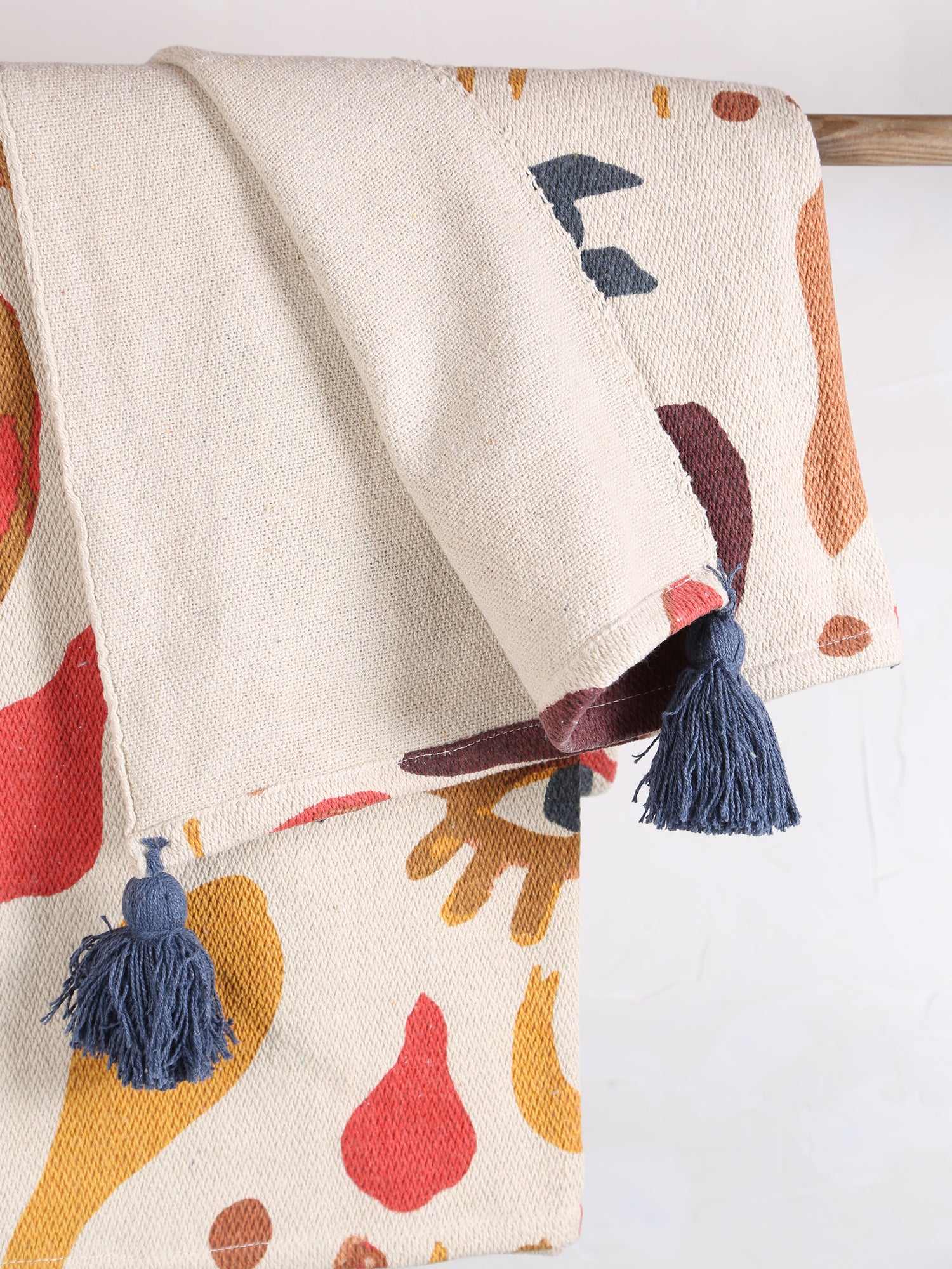Horus Throw  - Recycled Cotton - Face Motif, Warm Tones