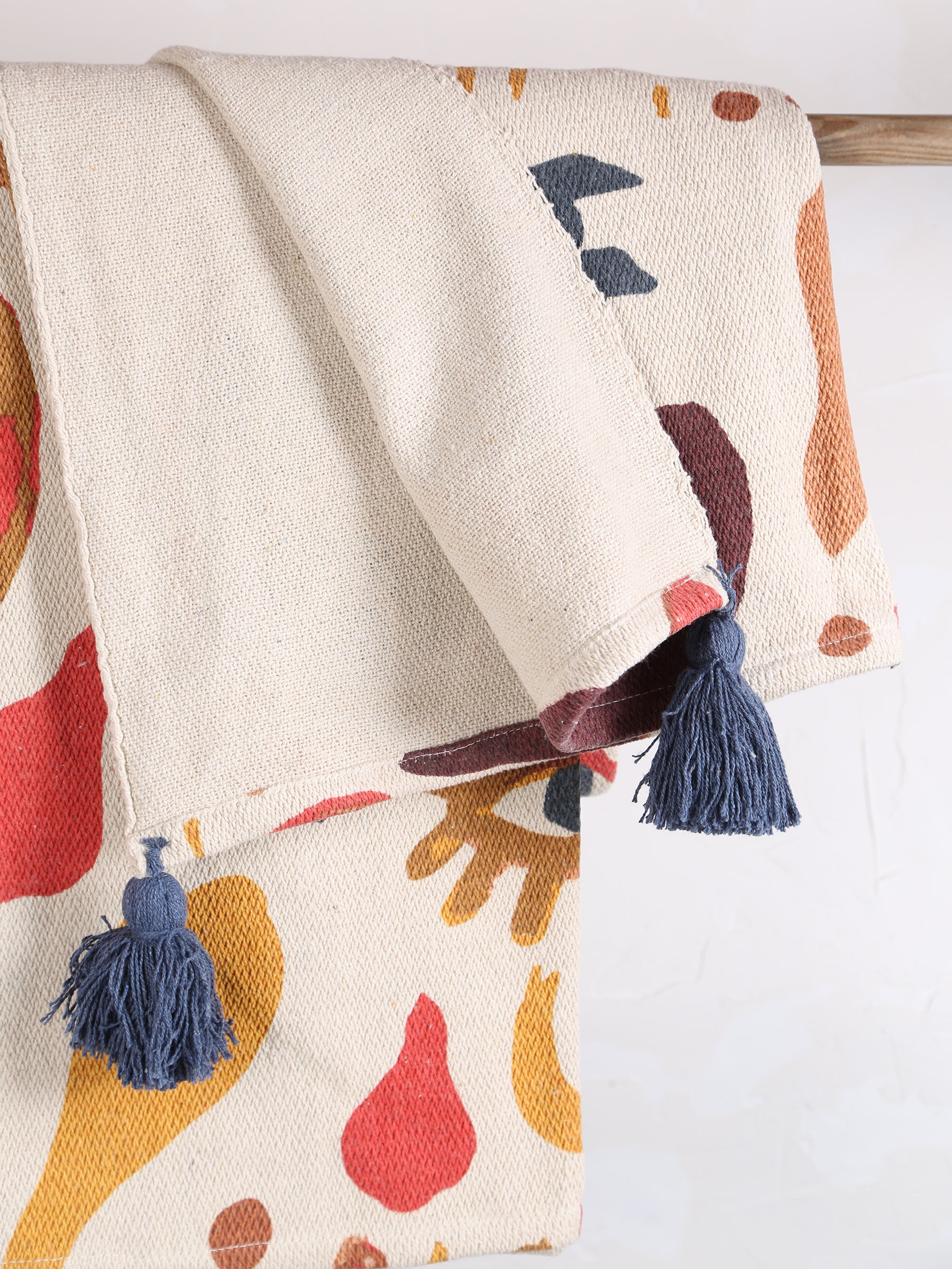 Horus Throw  - Recycled Cotton - Face Motif, Warm Tones