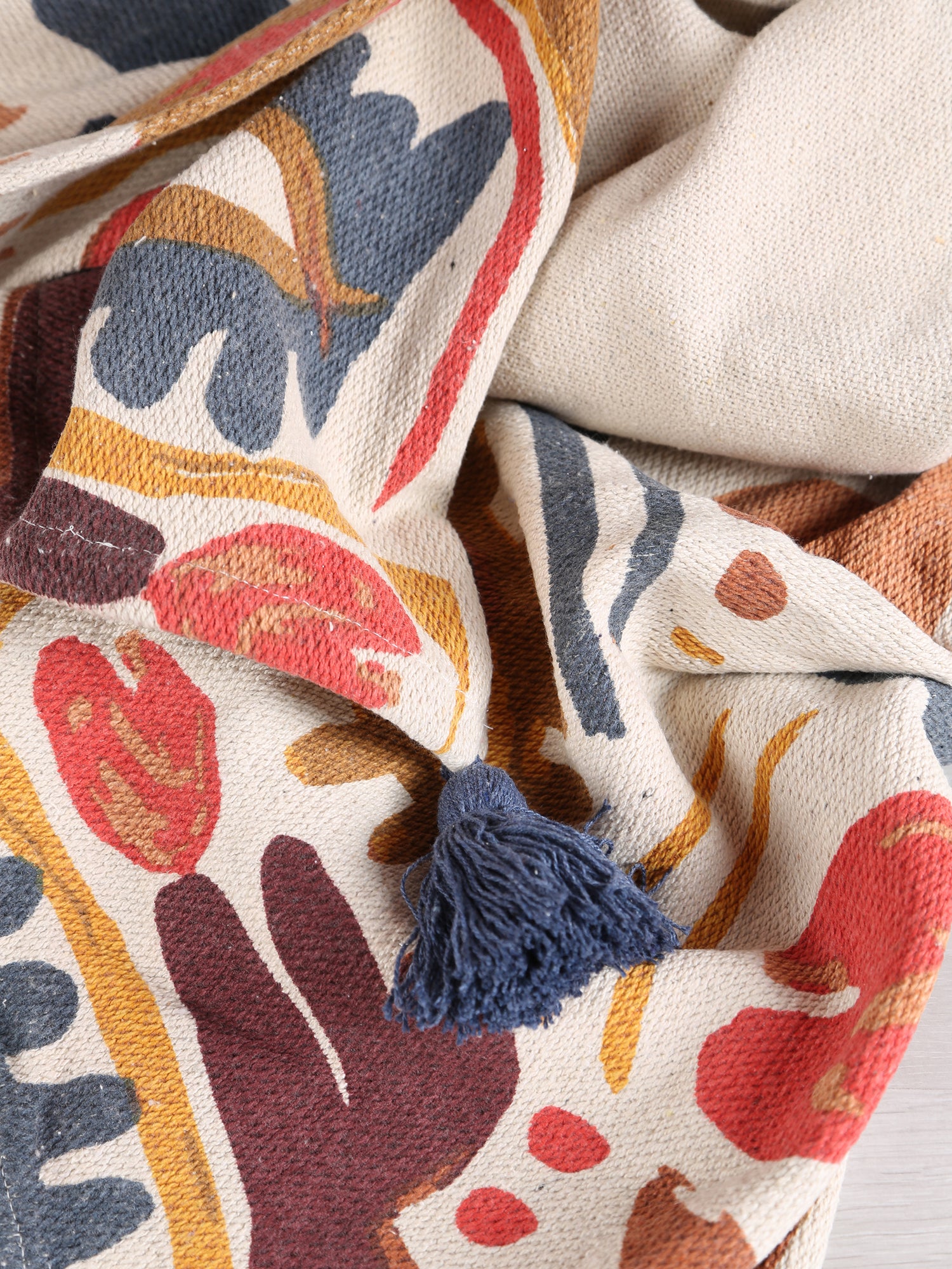 Horus Throw  - Recycled Cotton - Face Motif, Warm Tones