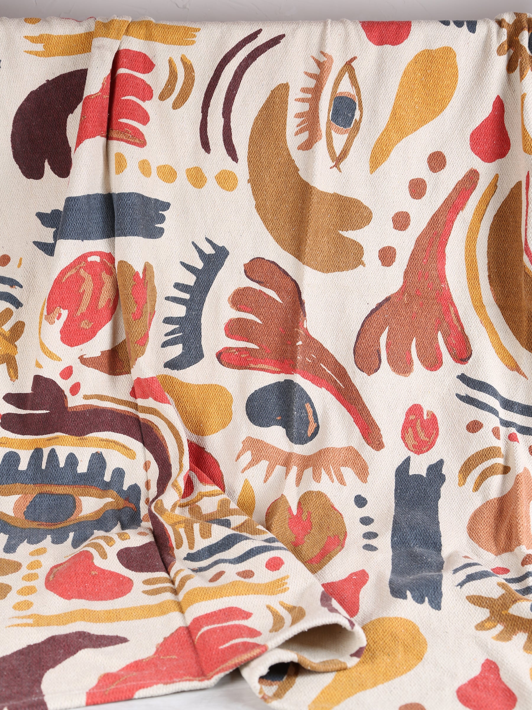 Horus Throw  - Recycled Cotton - Face Motif, Warm Tones