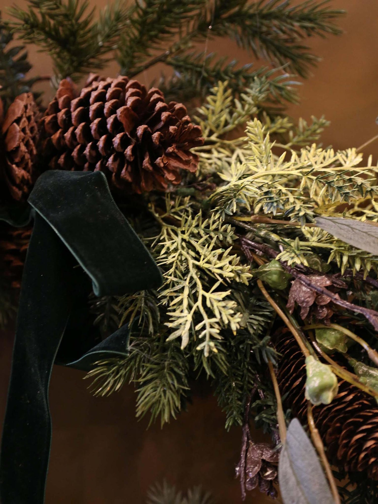 Faux Pine Foliage Bow Wreath