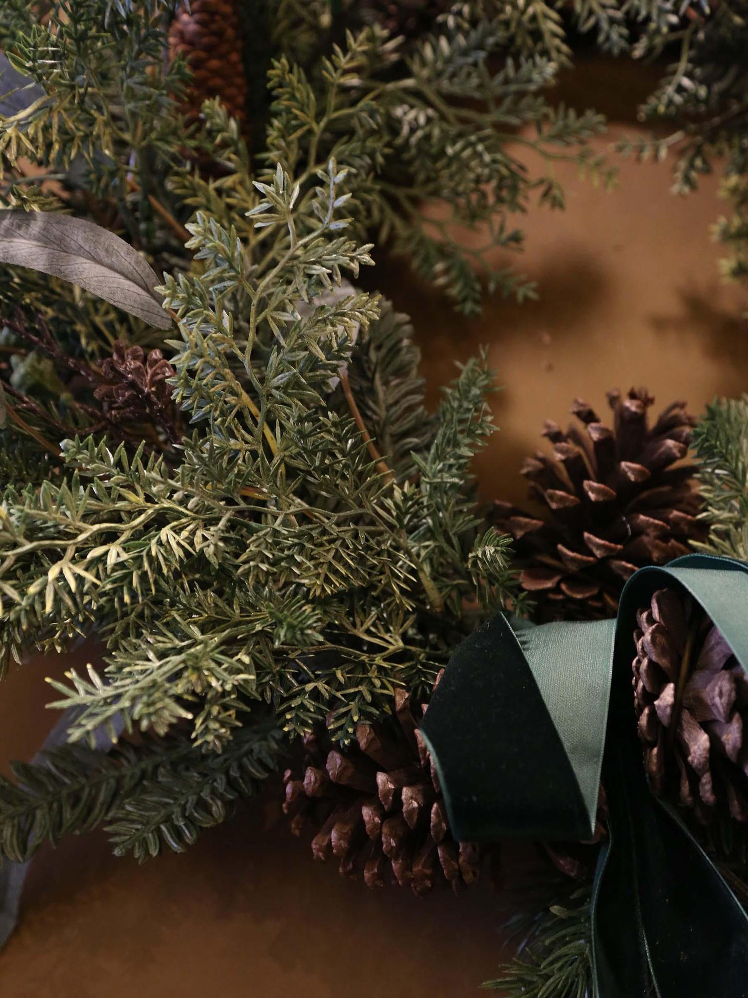 Faux Pine Foliage Bow Wreath