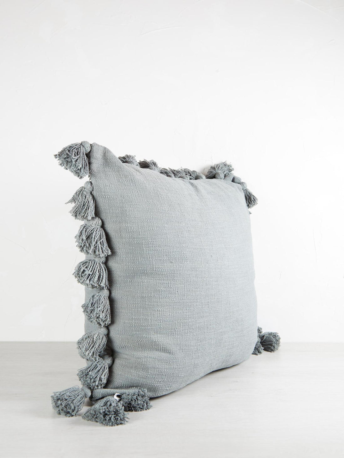 Emerald Cushion With Tassels