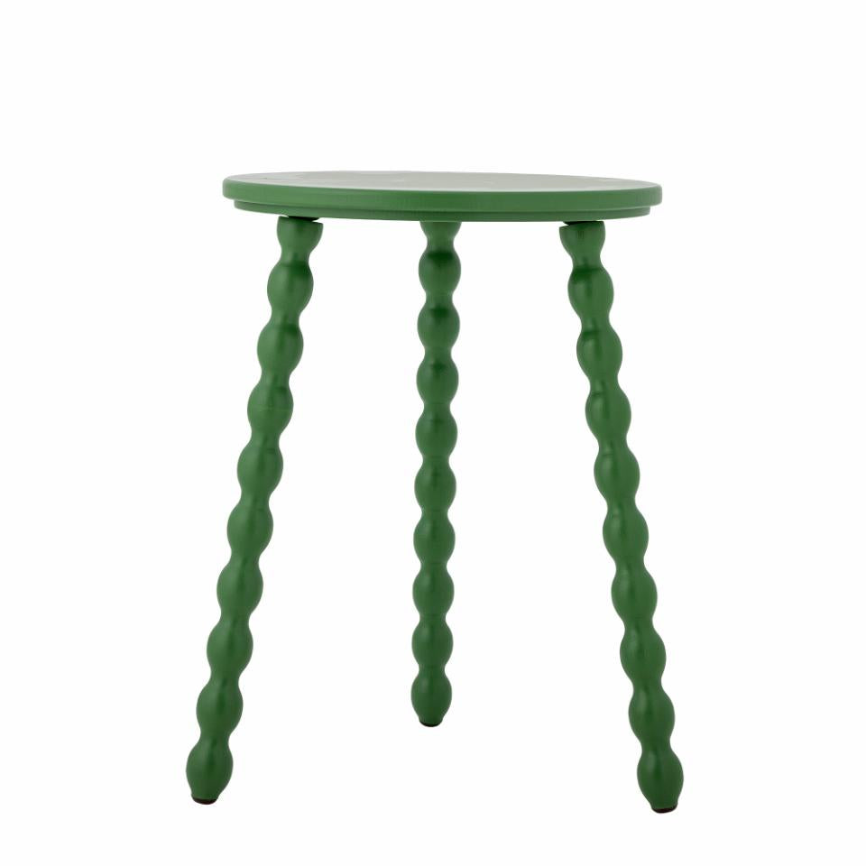 Salino Side Table by Bloomingville, a round green table with three bobbin-style legs, isolated on white.