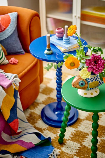 Bloomingville Salino Side Tables, blue and green, with bobbin legs, styled with flowers, candles, and colorful home decor.