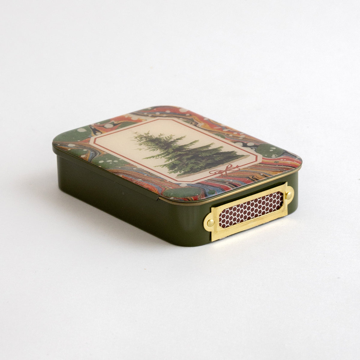 Roomytown Matches in Tin, dark green with a Christmas tree design and marbled border, featuring a gold striking surface.
