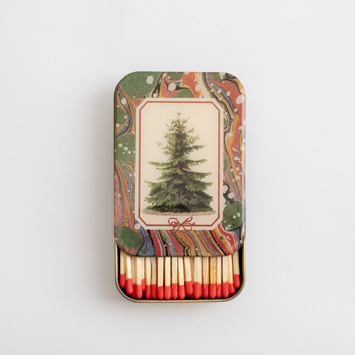 Roomytown Matches in Tin, with a vintage-style Christmas tree design and marbled lid, revealing red-tipped matches.