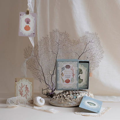 Roomytown Single Deck Playing Cards "Specimens of the Sea" box open, with playing cards, shells, coral, and lace.