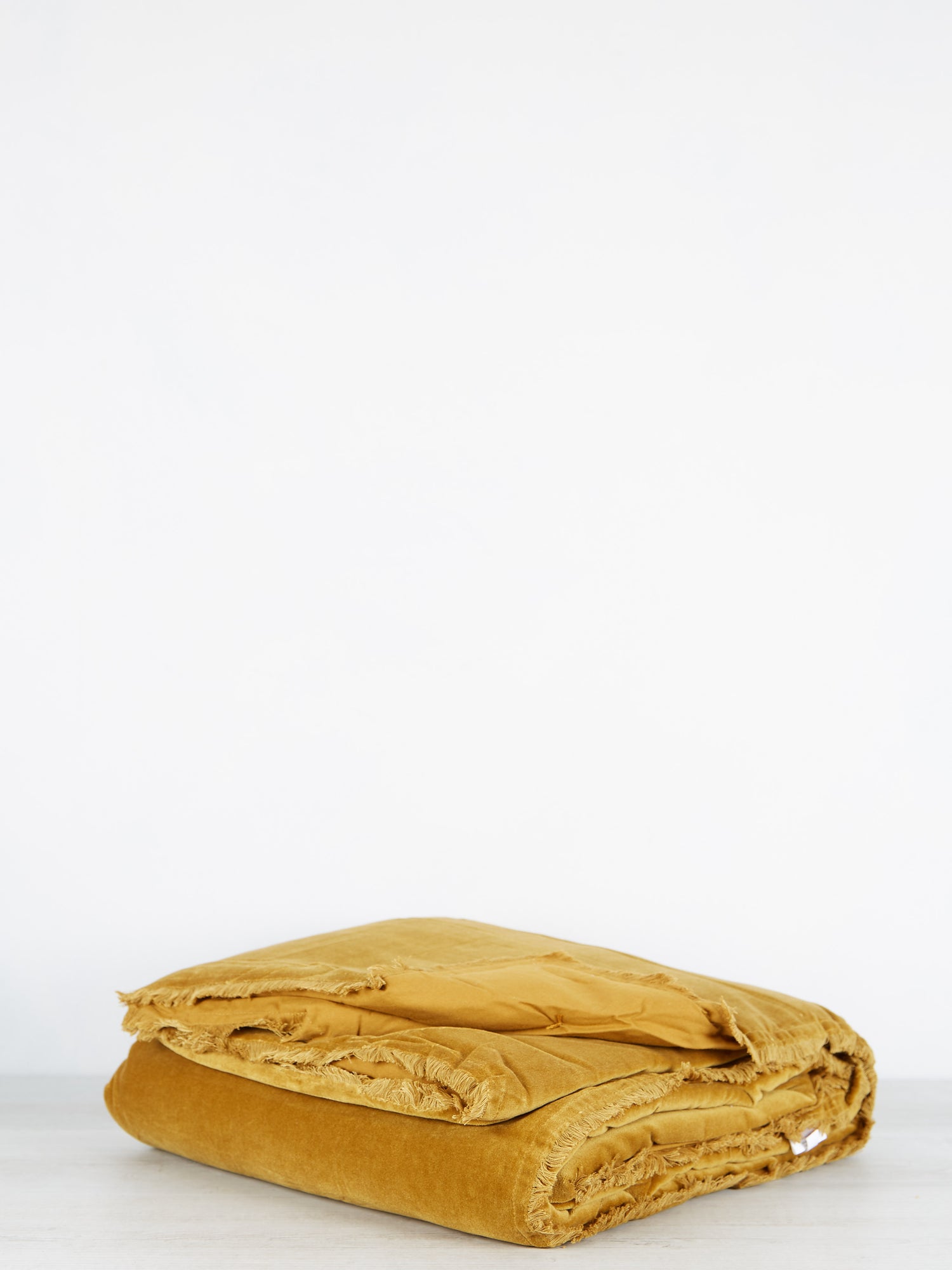 Fara Velvet Fringed Throw in Bronze